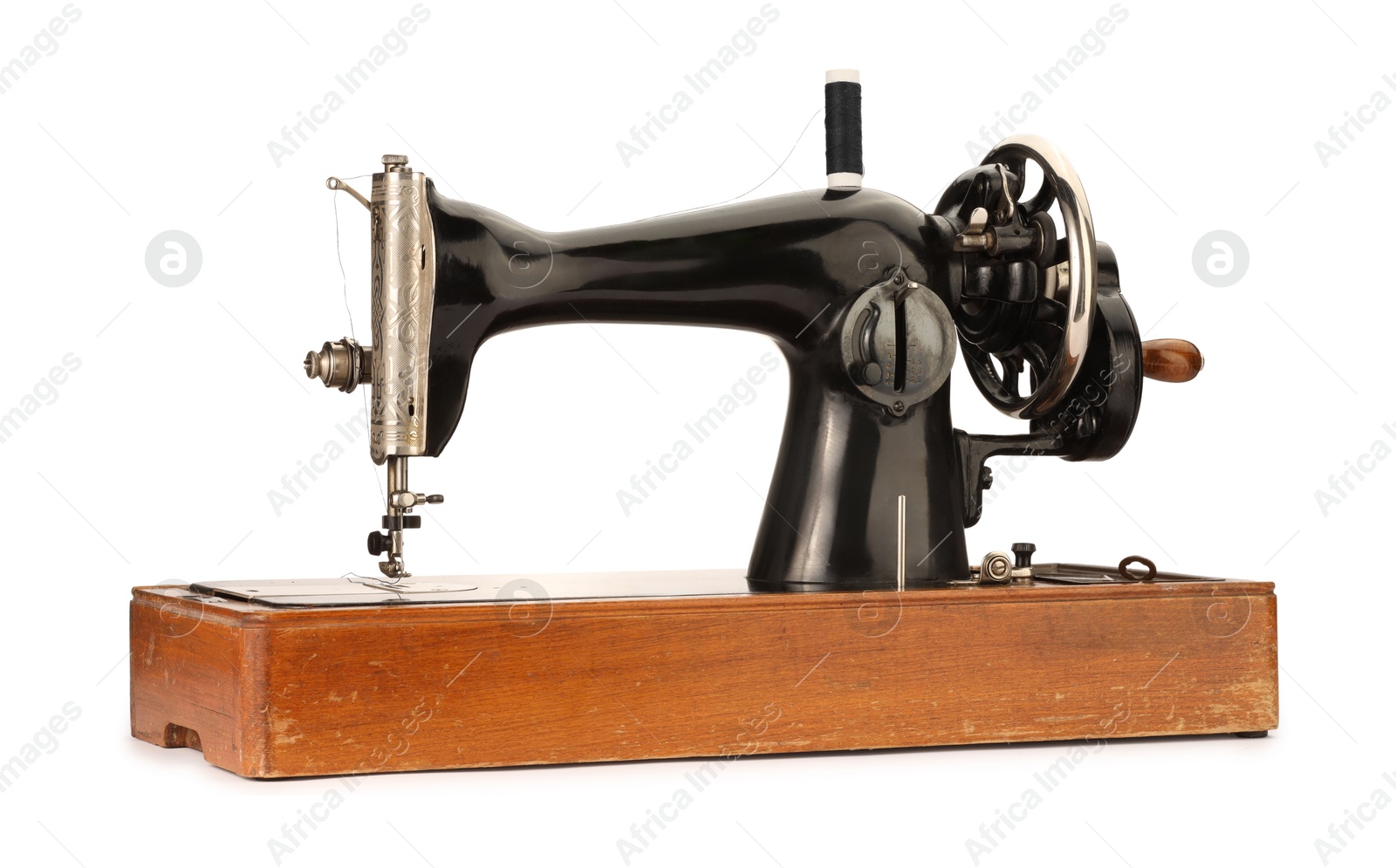 Photo of One vintage sewing machine isolated on white