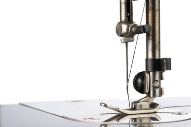 Photo of Sewing machine on white background, closeup view