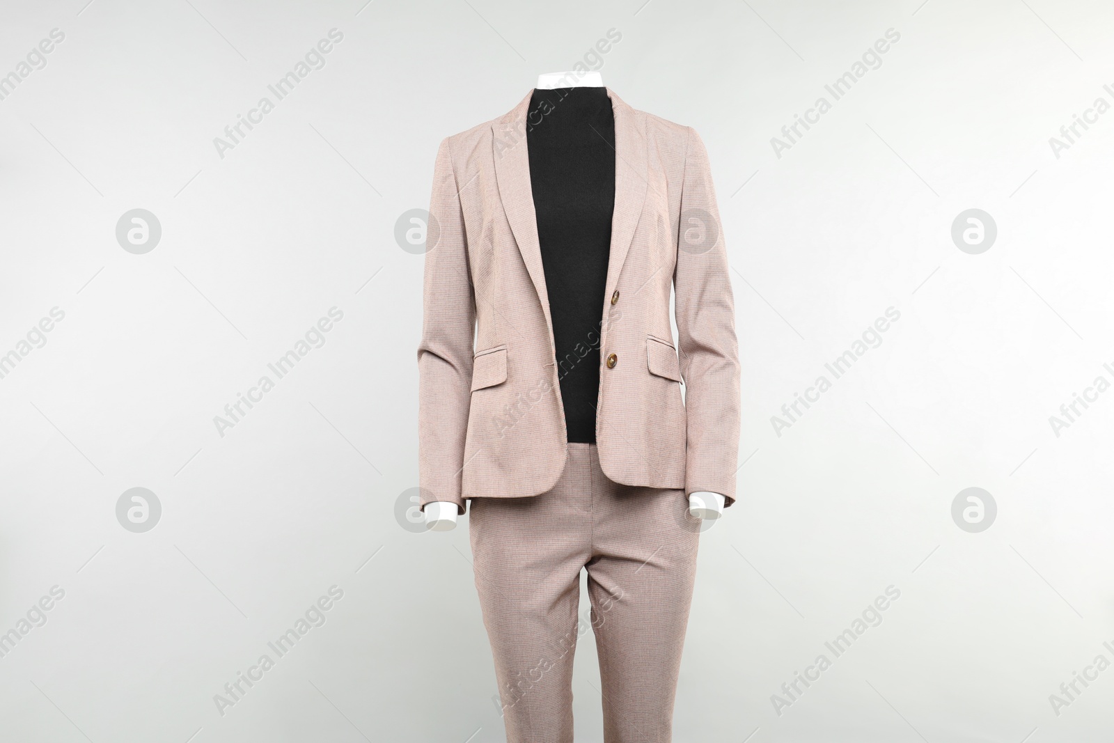 Photo of Female mannequin with stylish outfit on light background