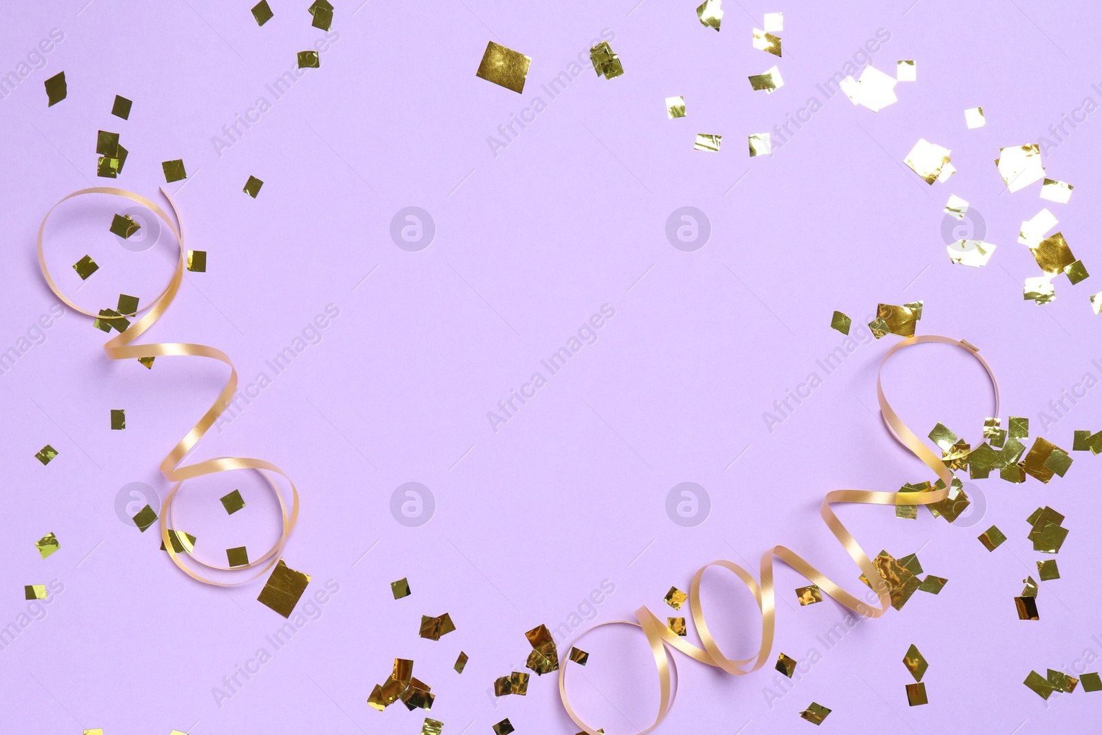 Photo of Frame of shiny confetti and streamers on violet background, flat lay. Space for text