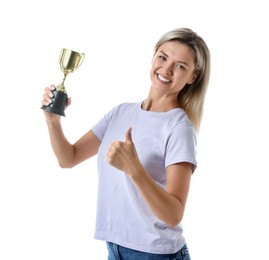 Happy winner with golden trophy cup showing thumbs up on white background