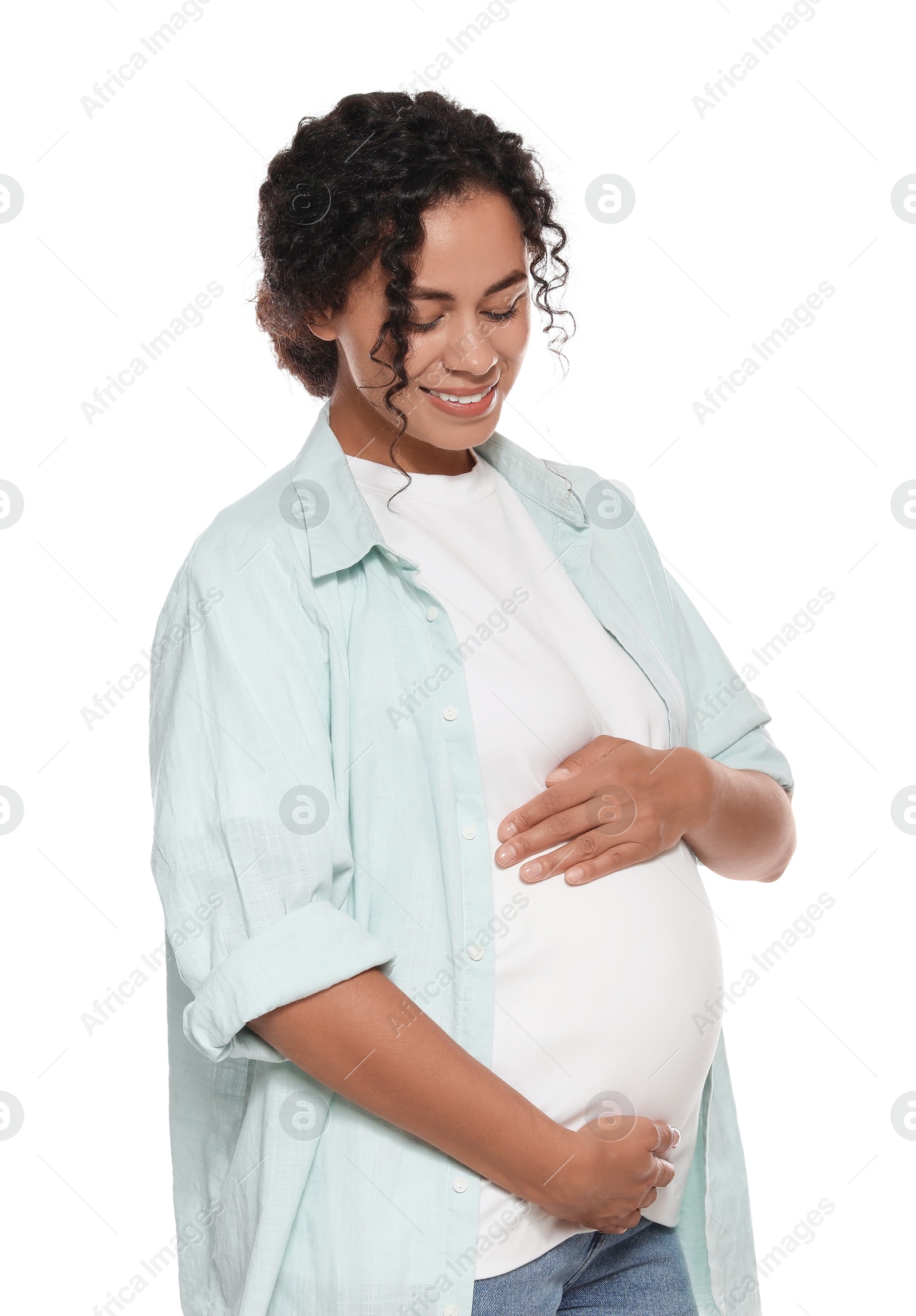 Photo of Portrait of beautiful pregnant woman on white background