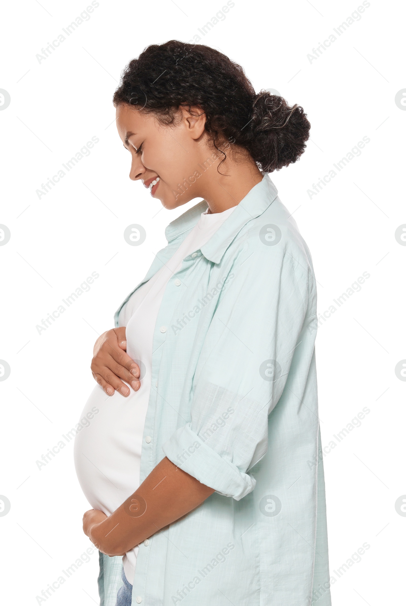 Photo of Portrait of beautiful pregnant woman on white background