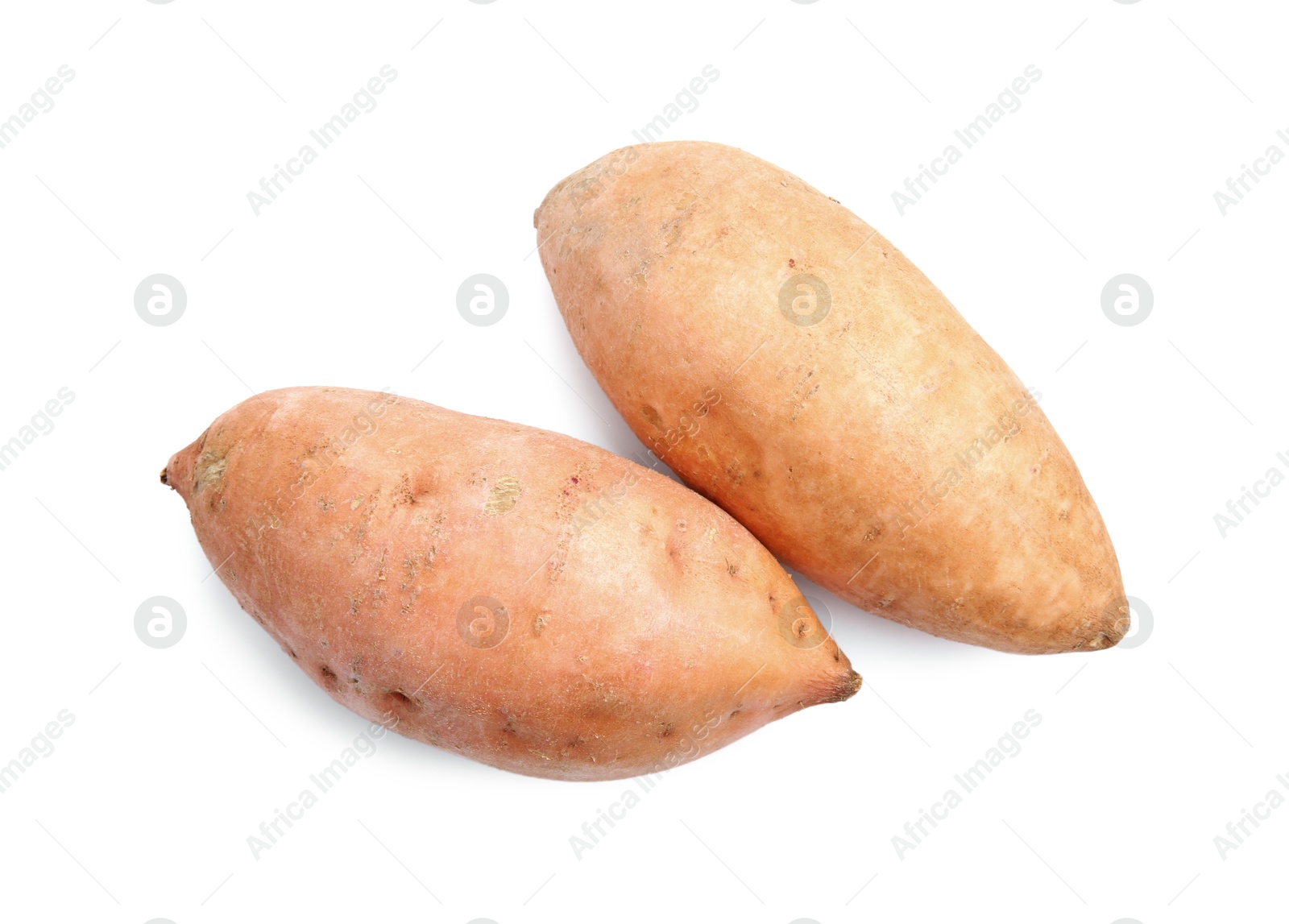Photo of Fresh raw sweet potatoes isolated on white, top view