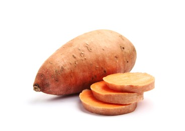 Photo of Fresh raw sweet potatoes isolated on white