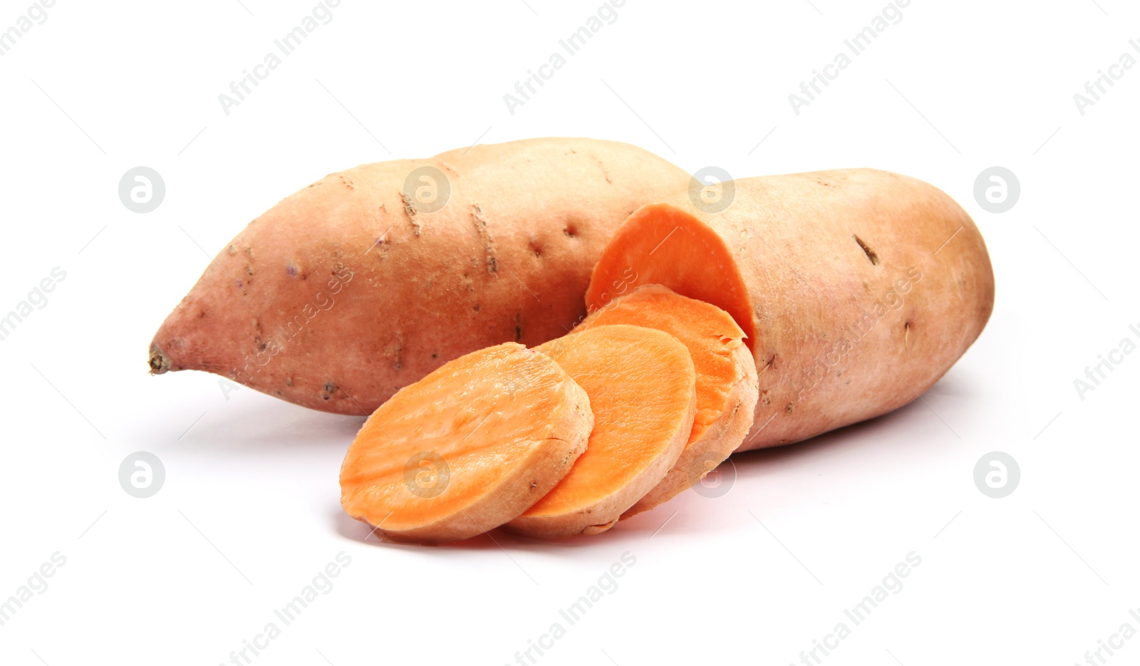 Photo of Fresh raw sweet potatoes isolated on white