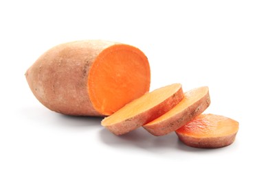 Photo of Cut raw sweet potato isolated on white