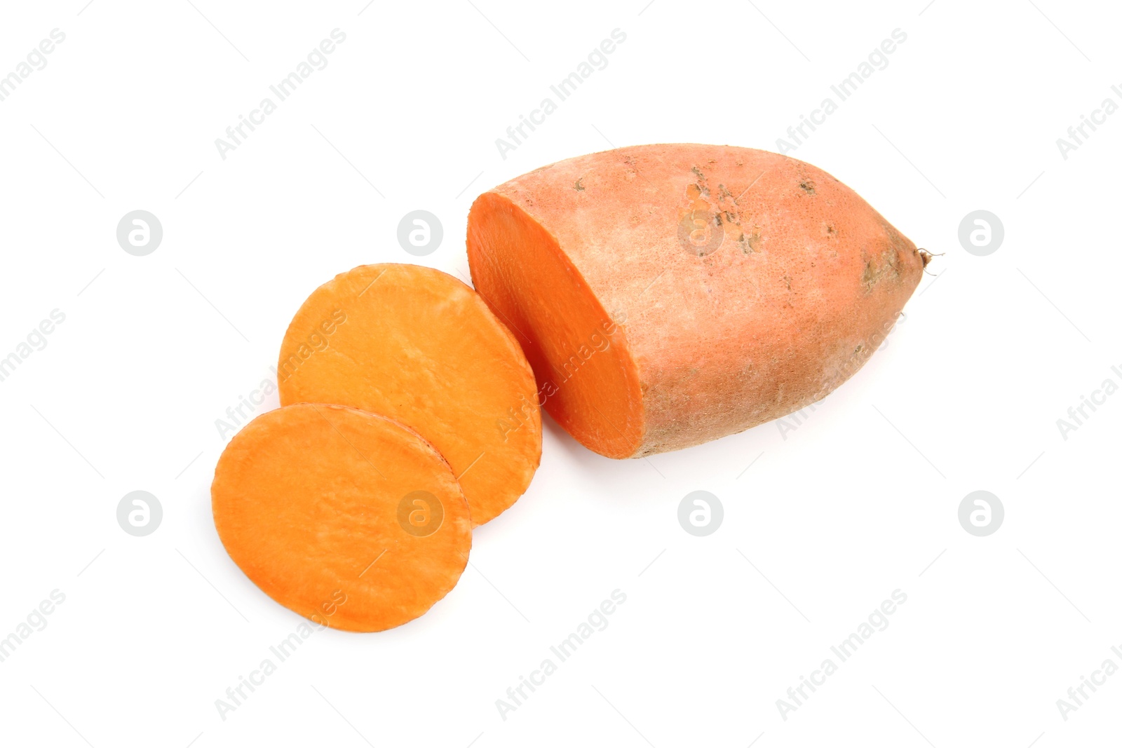 Photo of Cut raw sweet potato isolated on white, top view