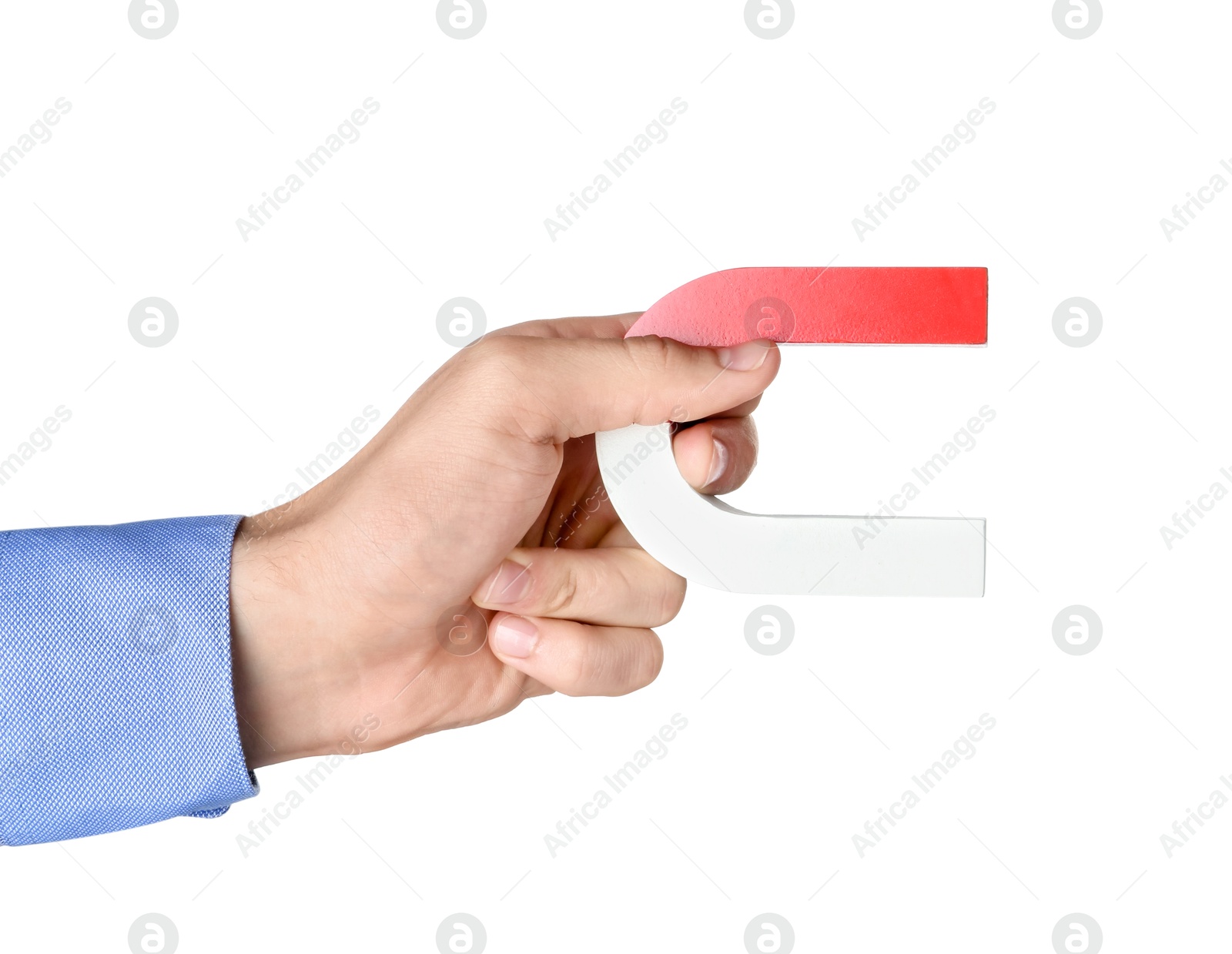 Photo of Man with horseshoe magnet on white background, closeup