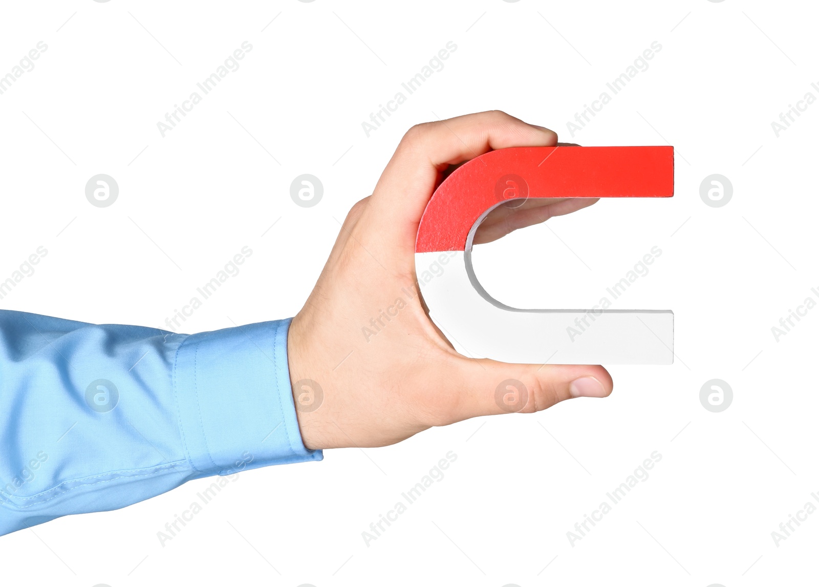 Photo of Man with horseshoe magnet on white background, closeup