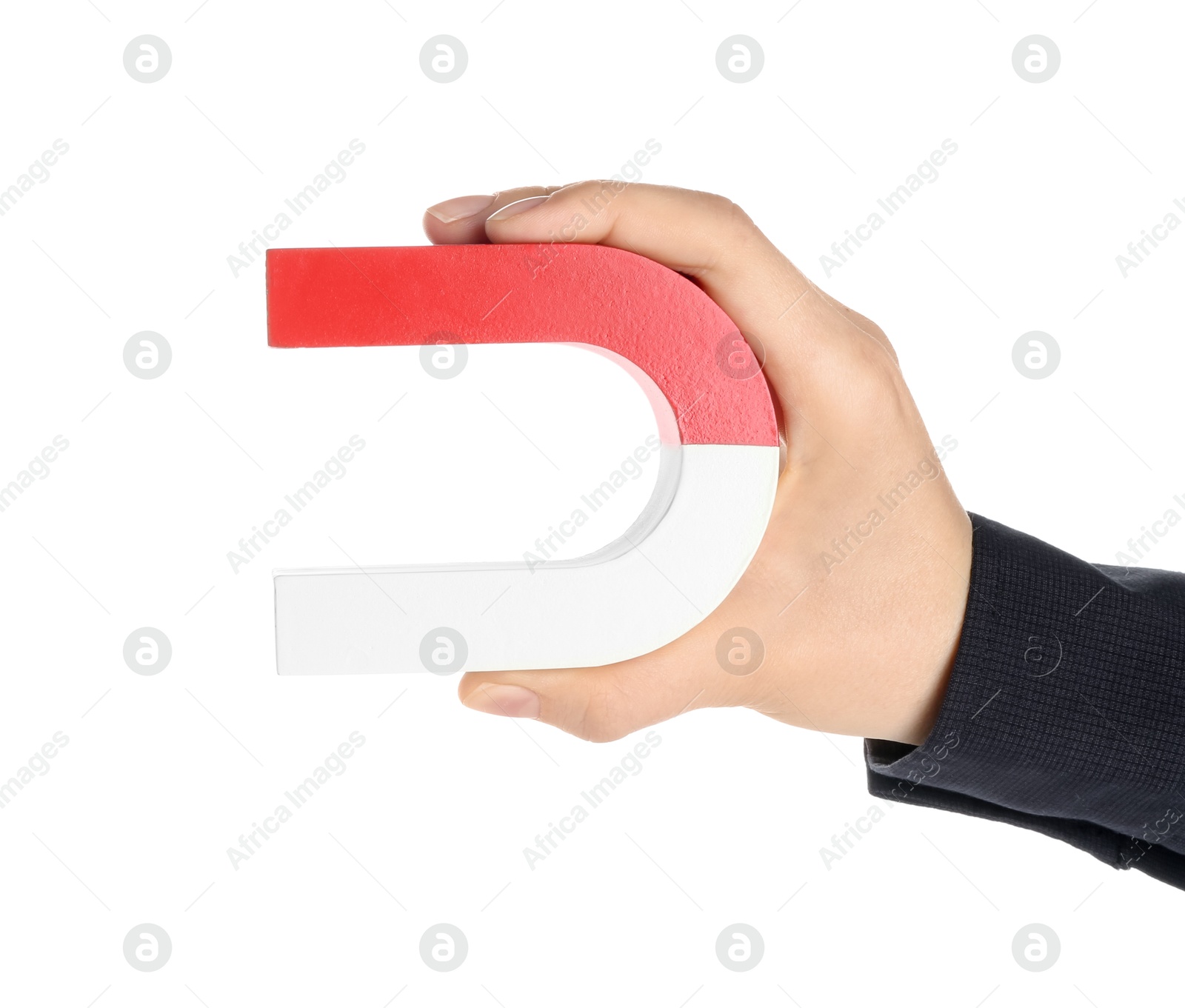 Photo of Woman with horseshoe magnet on white background, closeup