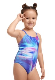 Photo of Cute little girl in swimsuit on white background