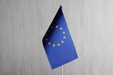 Photo of One flag of European Union on grey textured background