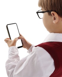 Photo of Little boy with smartphone on white background