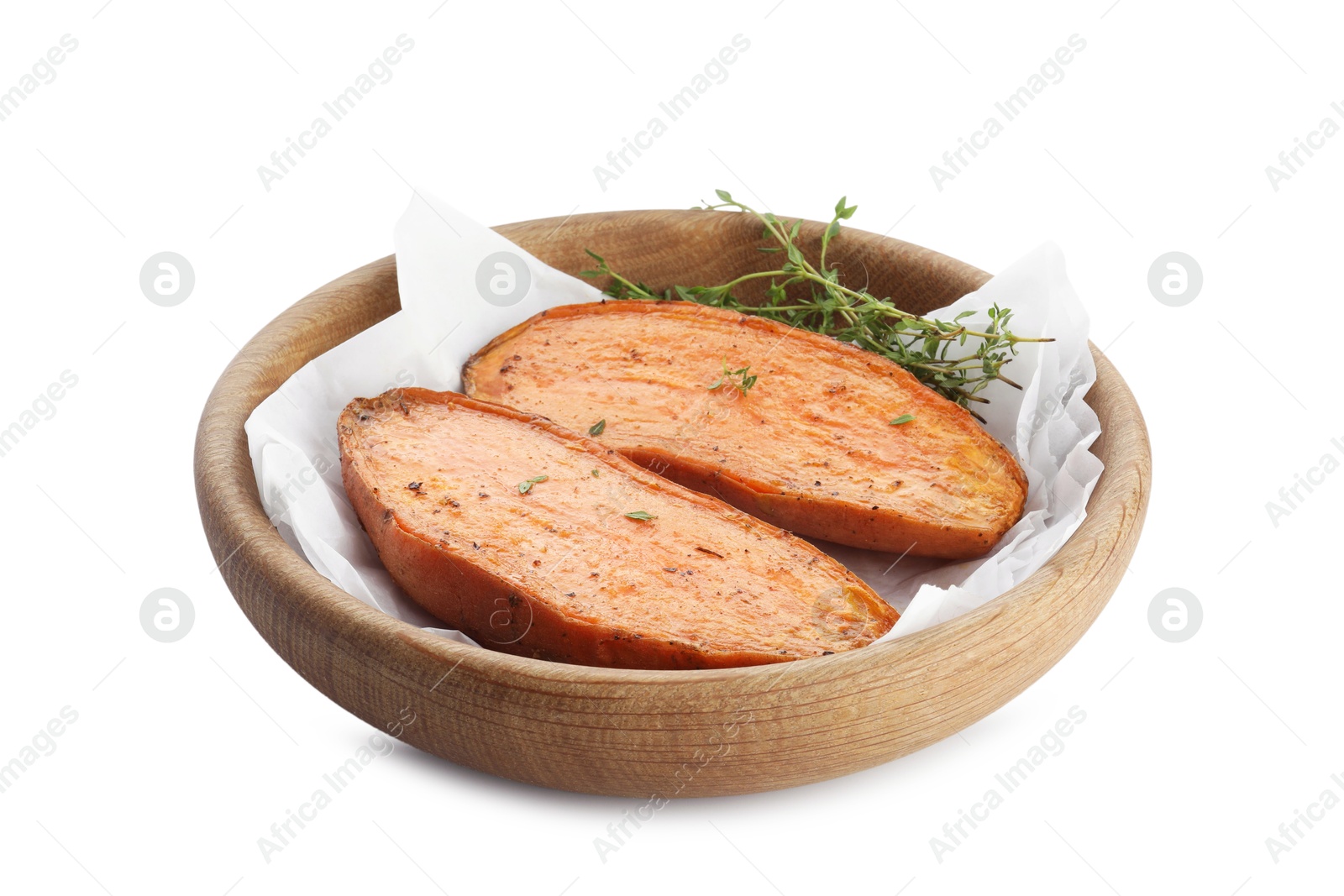 Photo of Halves of tasty cooked sweet potato with thyme isolated on white