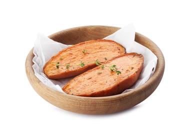 Photo of Halves of tasty cooked sweet potato with thyme isolated on white