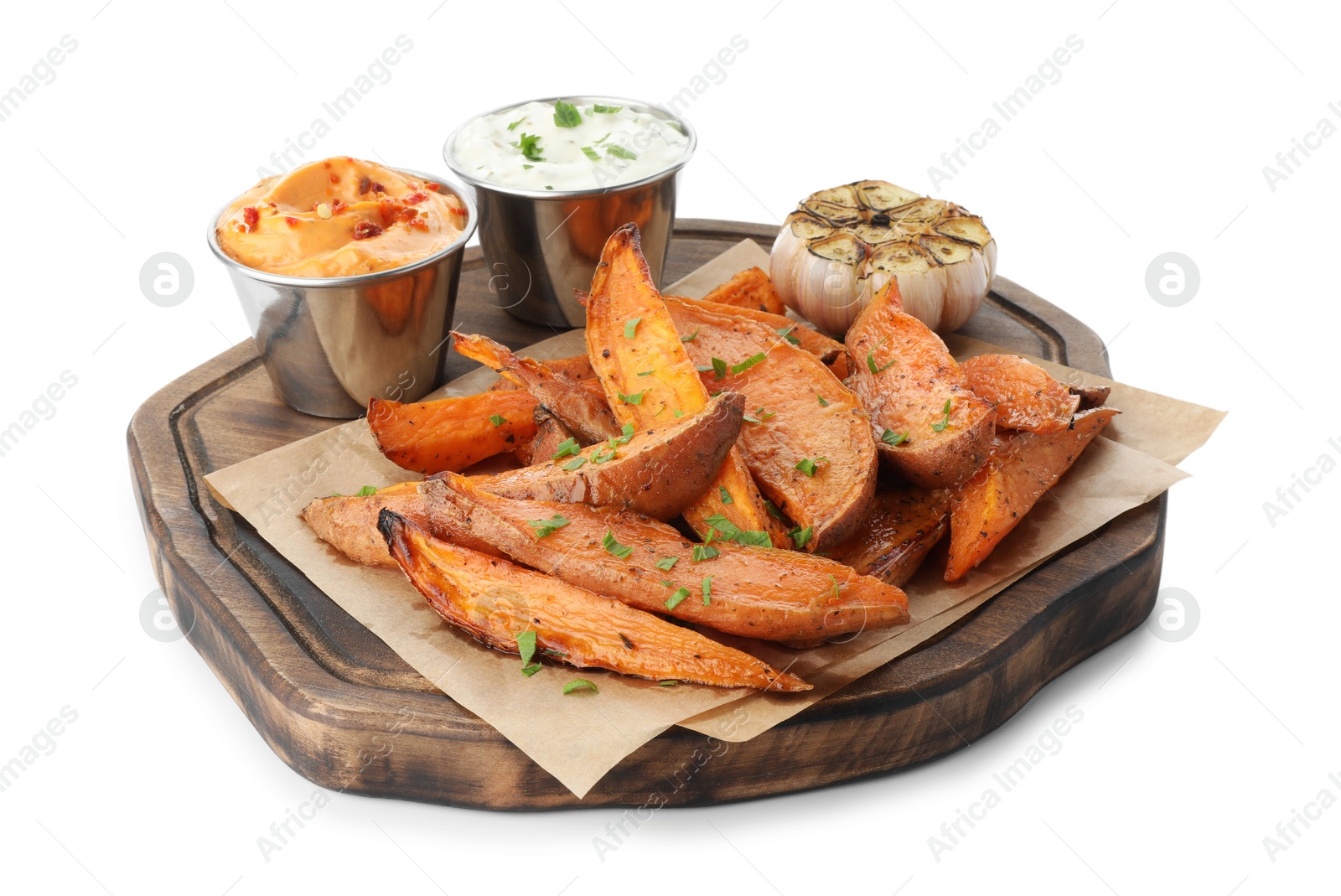 Photo of Tasty cooked sweet potatoes, sauces and garlic isolated on white