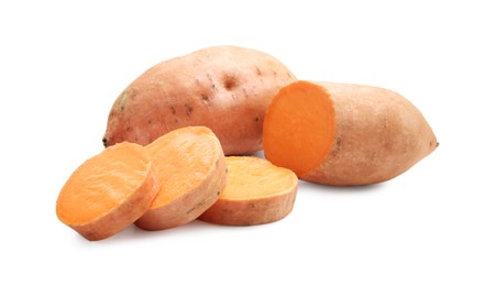 Photo of Fresh raw sweet potatoes isolated on white