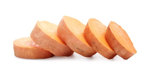 Photo of Pieces of raw sweet potato isolated on white