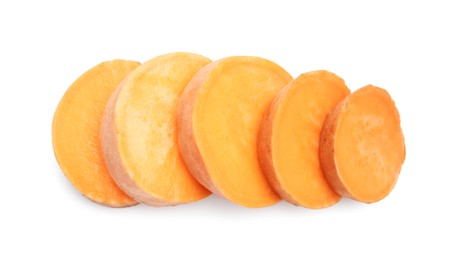 Photo of Pieces of raw sweet potato isolated on white, top view