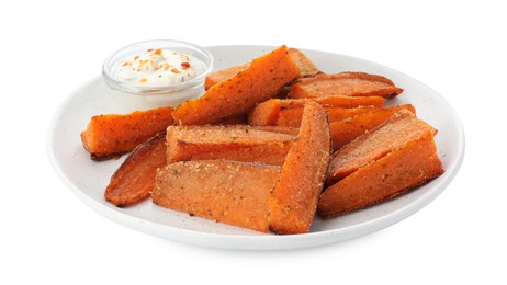 Photo of Pieces of tasty baked sweet potato with sauce isolated on white