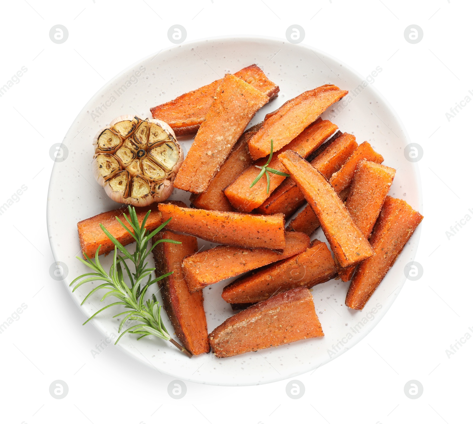 Photo of Pieces of tasty baked sweet potato with garlic and rosemary isolated on white, top view