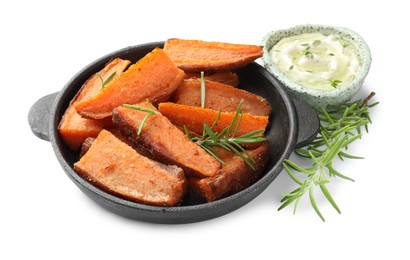 Photo of Pieces of tasty cooked sweet potato and rosemary in baking dish served with sauce isolated on white