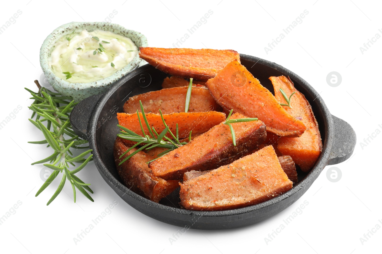 Photo of Pieces of tasty cooked sweet potato and rosemary in baking dish served with sauce isolated on white