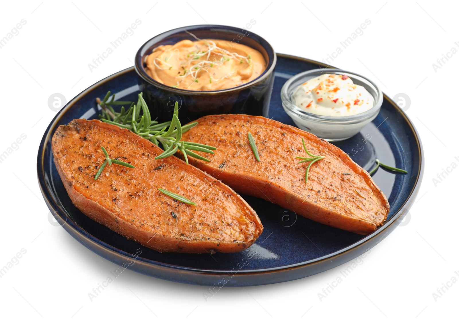 Photo of Halves of tasty baked sweet potato served with sauces isolated on white