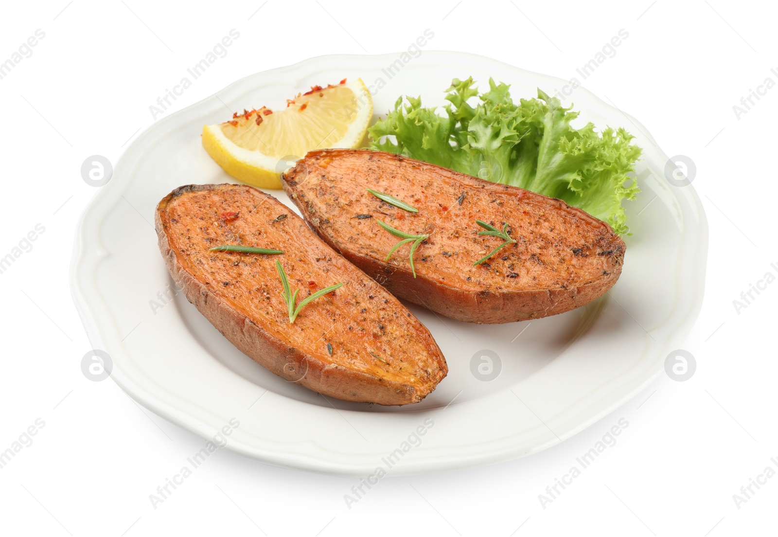 Photo of Tasty baked sweet potato with lemon, lettuce and rosemary isolated on white