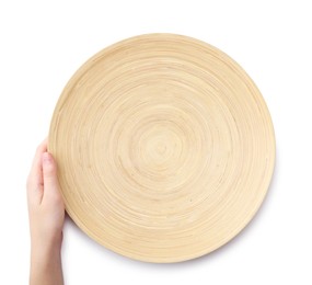 Woman holding wooden plate on white background, top view