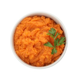 Photo of Tasty mashed sweet potato and parsley in bowl isolated on white, top view