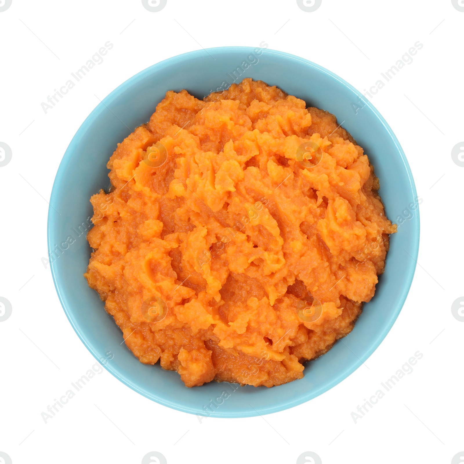 Photo of Tasty mashed sweet potato in bowl isolated on white, top view