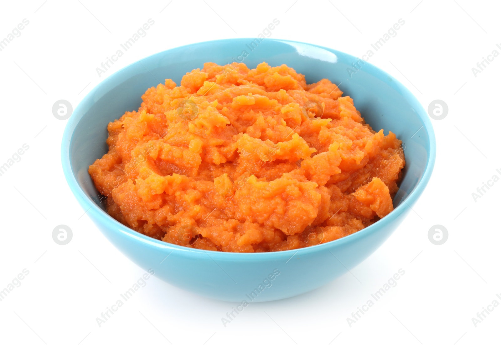 Photo of Tasty mashed sweet potato in bowl isolated on white