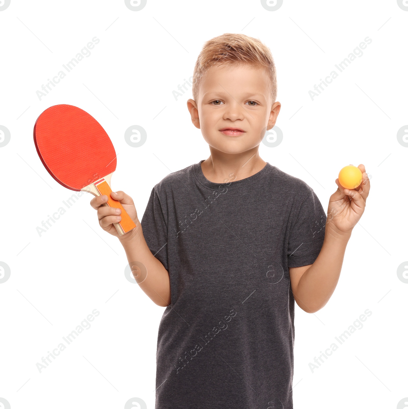 Photo of Little boy with ping pong racket and ball on white background