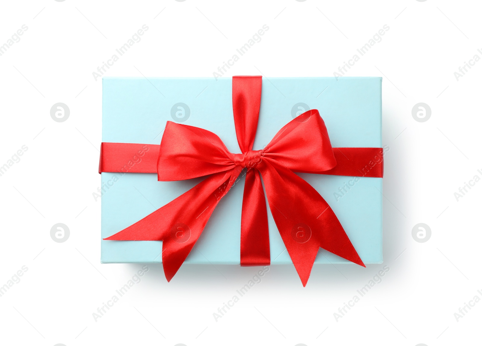 Photo of Beautiful gift box with red bow isolated on white, top view