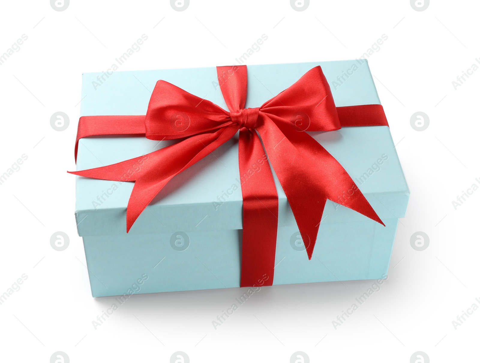 Photo of Beautiful gift box with red bow isolated on white