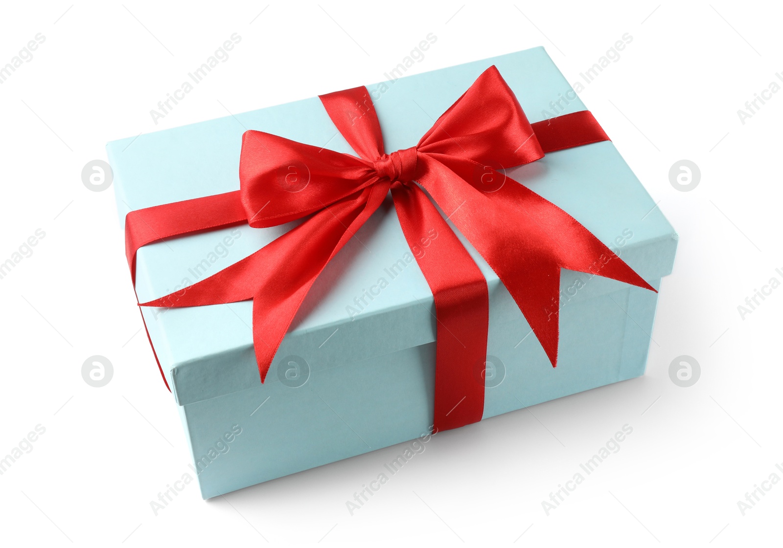 Photo of Beautiful gift box with red bow isolated on white