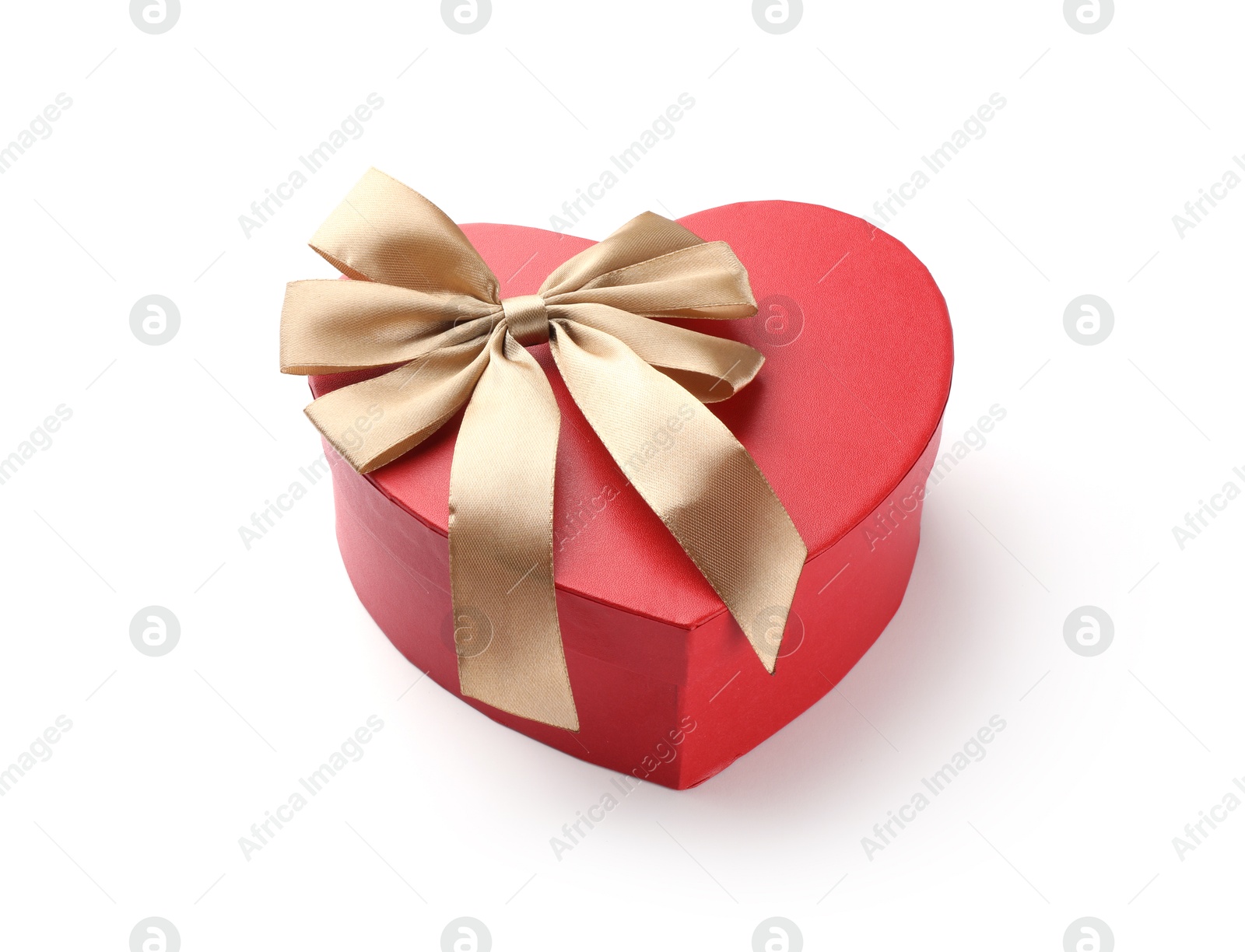 Photo of Heart shaped gift box with golden bow isolated on white