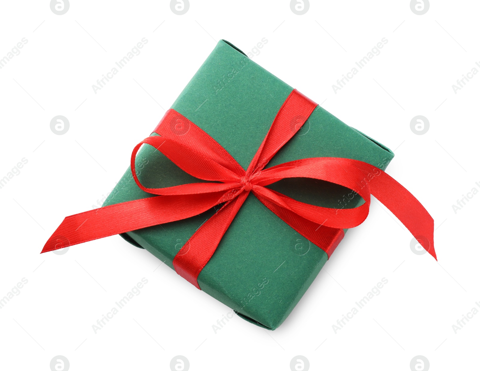 Photo of Beautiful gift box with red bow isolated on white, top view