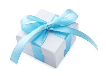 Photo of Beautiful gift box with light blue bow isolated on white