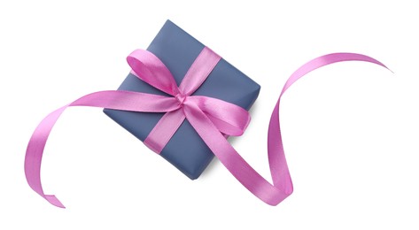 Photo of Beautiful gift box with pink bow isolated on white, top view