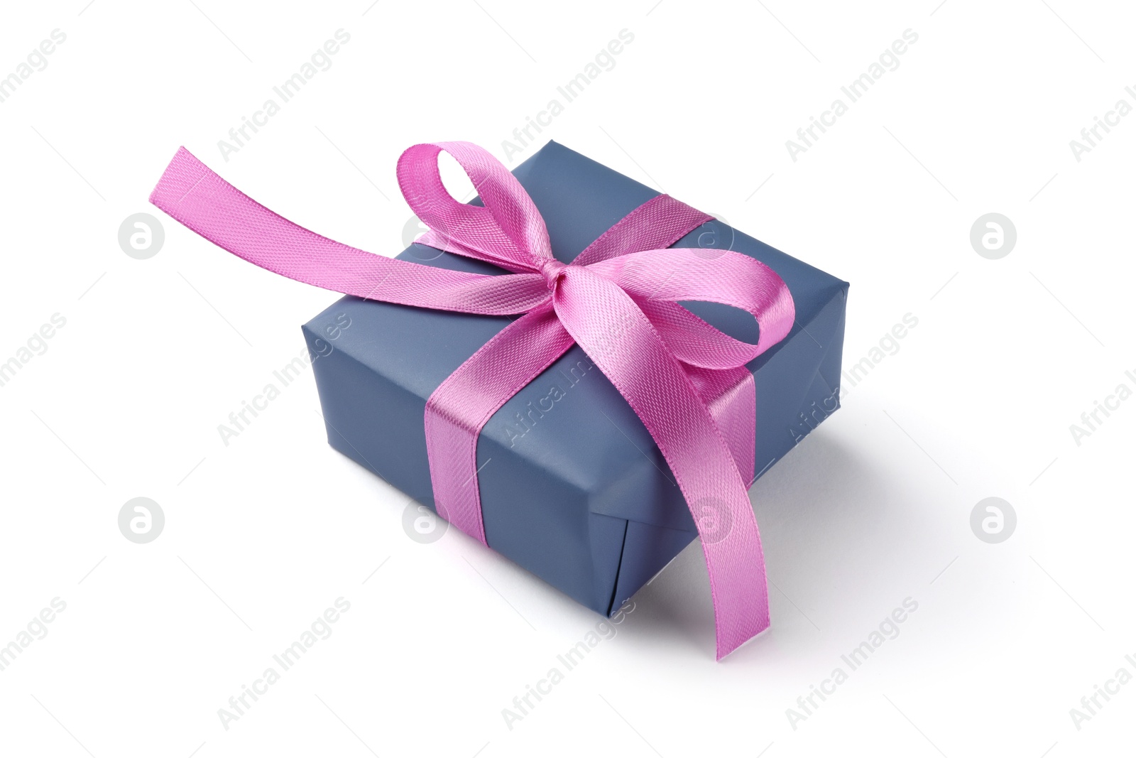 Photo of Beautiful gift box with pink bow isolated on white