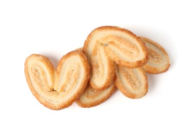 Photo of Tasty french palmier cookies isolated on white, top view