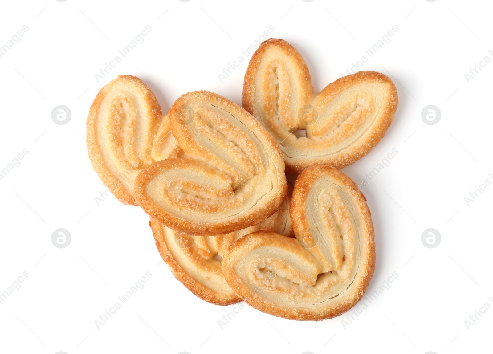 Photo of Tasty french palmier cookies isolated on white, top view