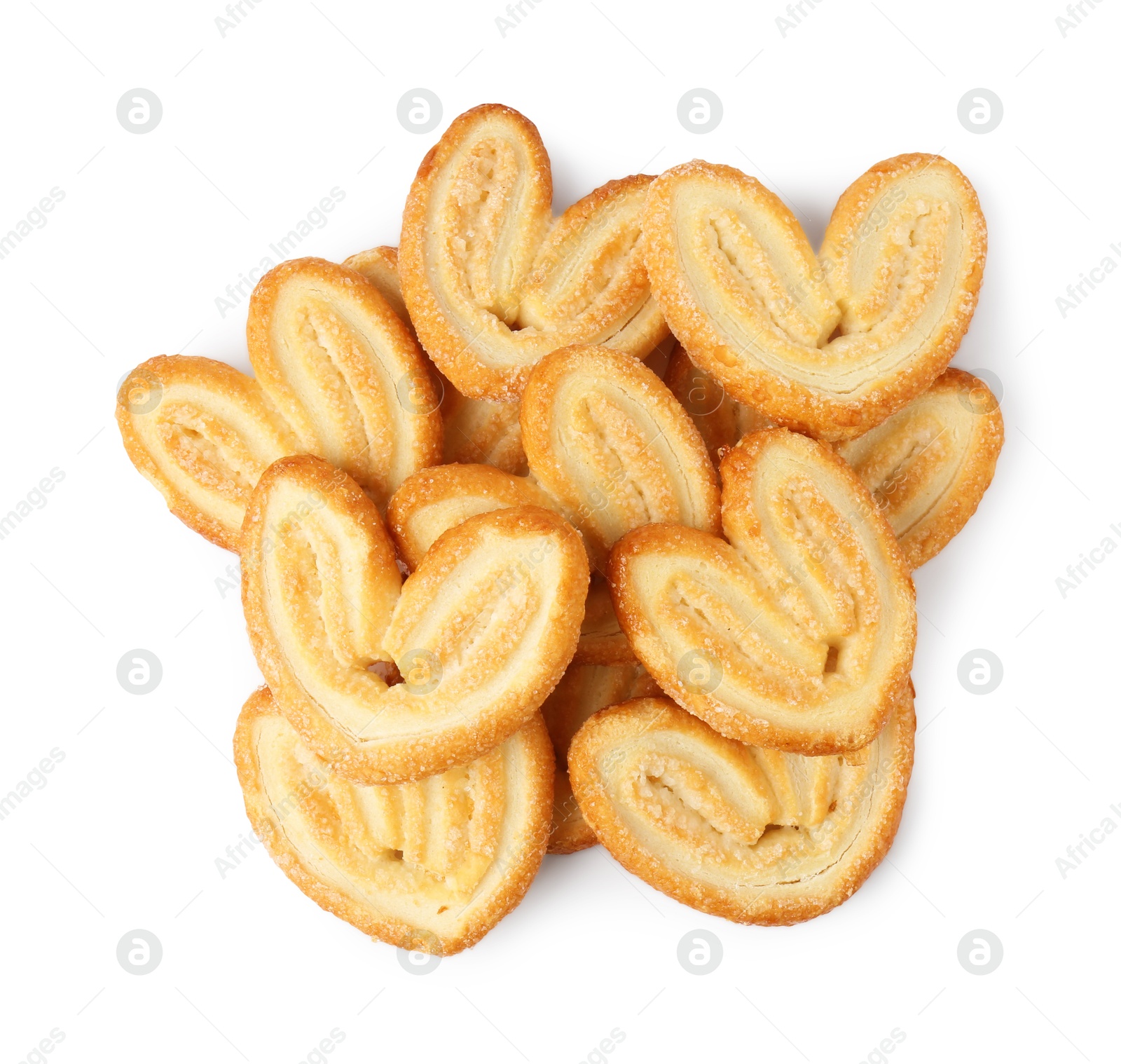 Photo of Tasty french palmier cookies isolated on white, top view