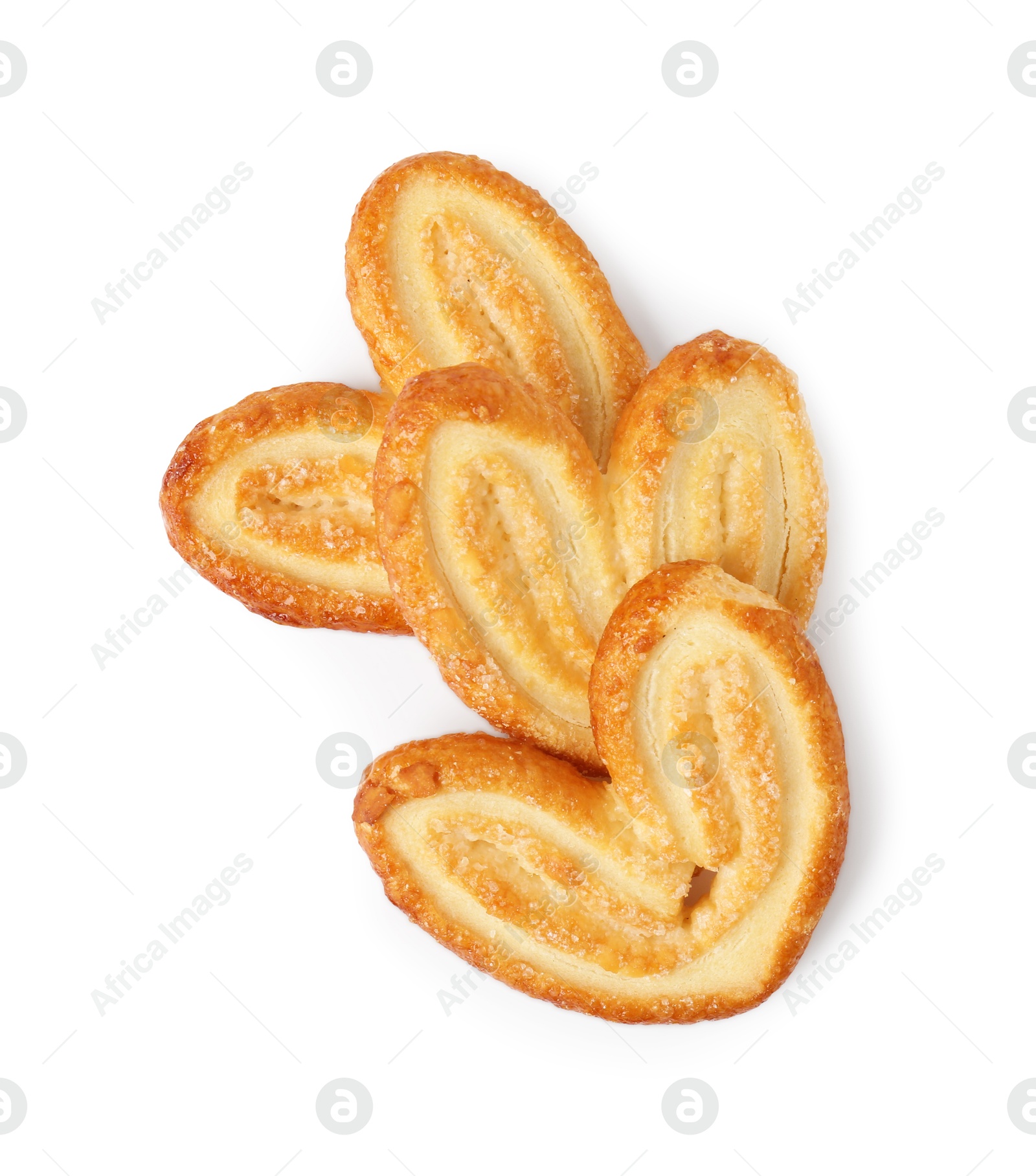 Photo of Tasty french palmier cookies isolated on white, top view