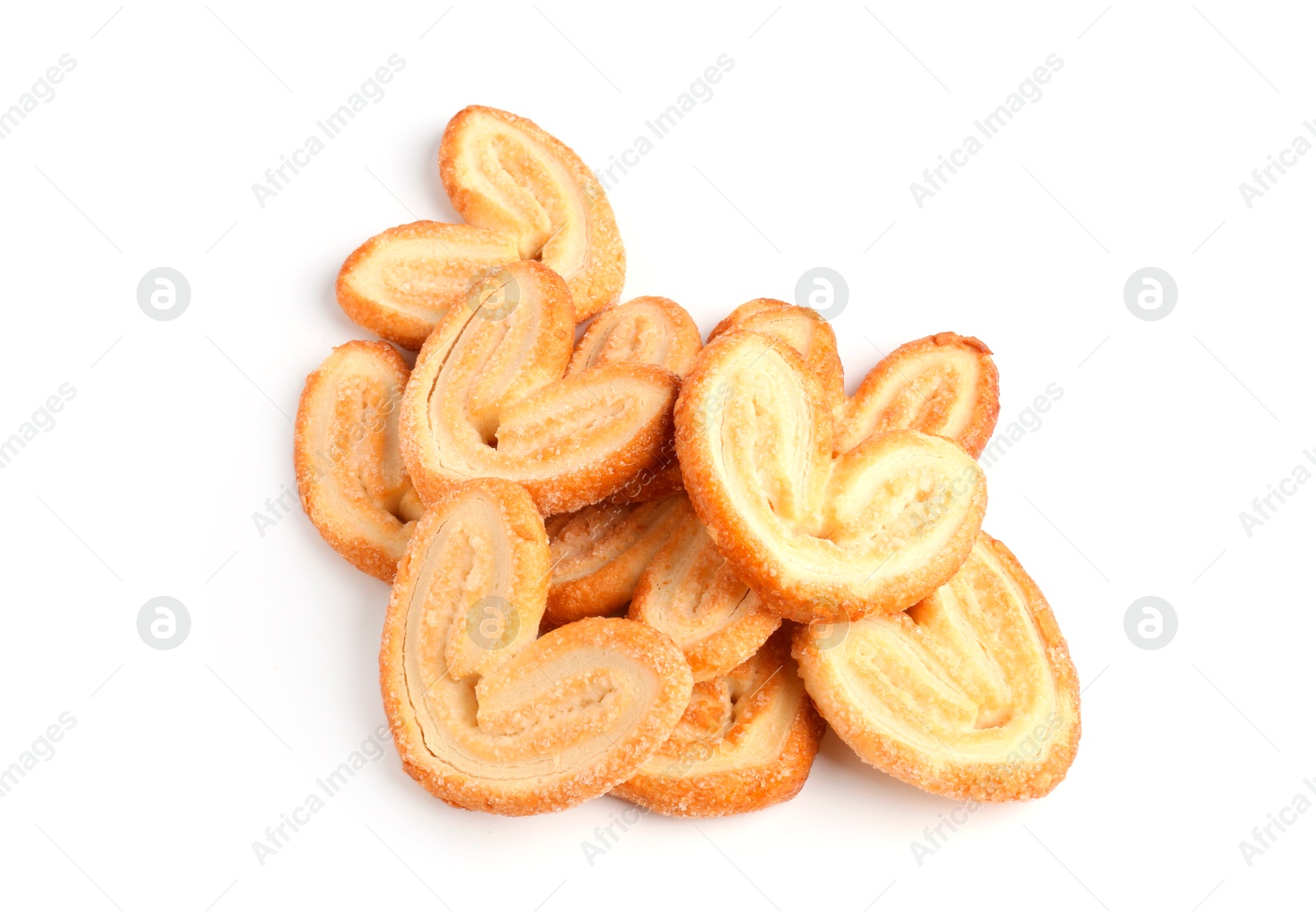 Photo of Tasty french palmier cookies isolated on white, top view