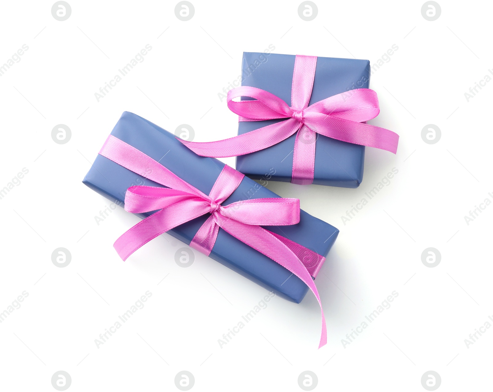 Photo of Beautiful gift boxes with pink bows isolated on white, top view