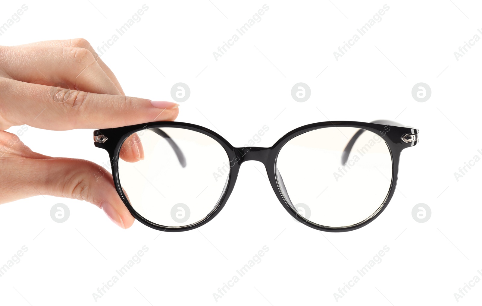 Photo of Woman holding glasses with black frame on white background, closeup